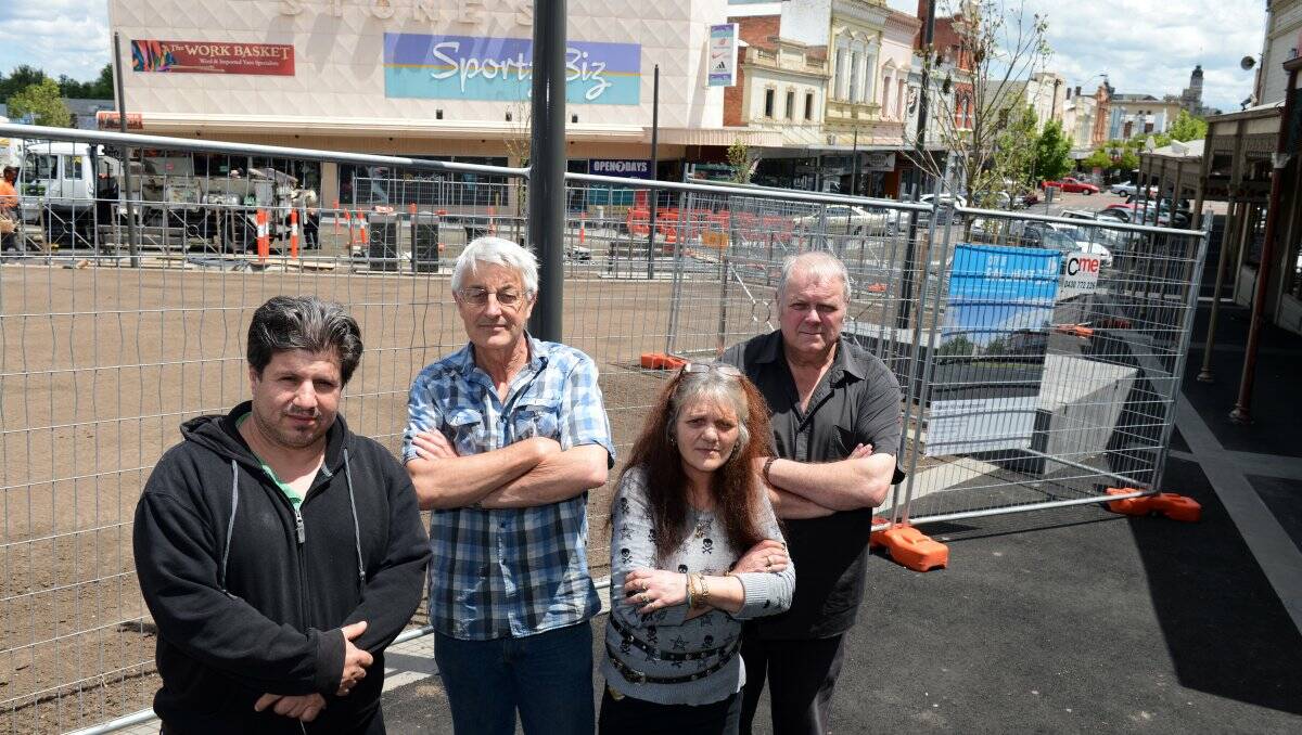 Bakery Hill business owners, from left, Sam Halloum, Rob McNamara, Kay Stevenson and Rob Hand, who say they are losing business due to the road works in the area. 