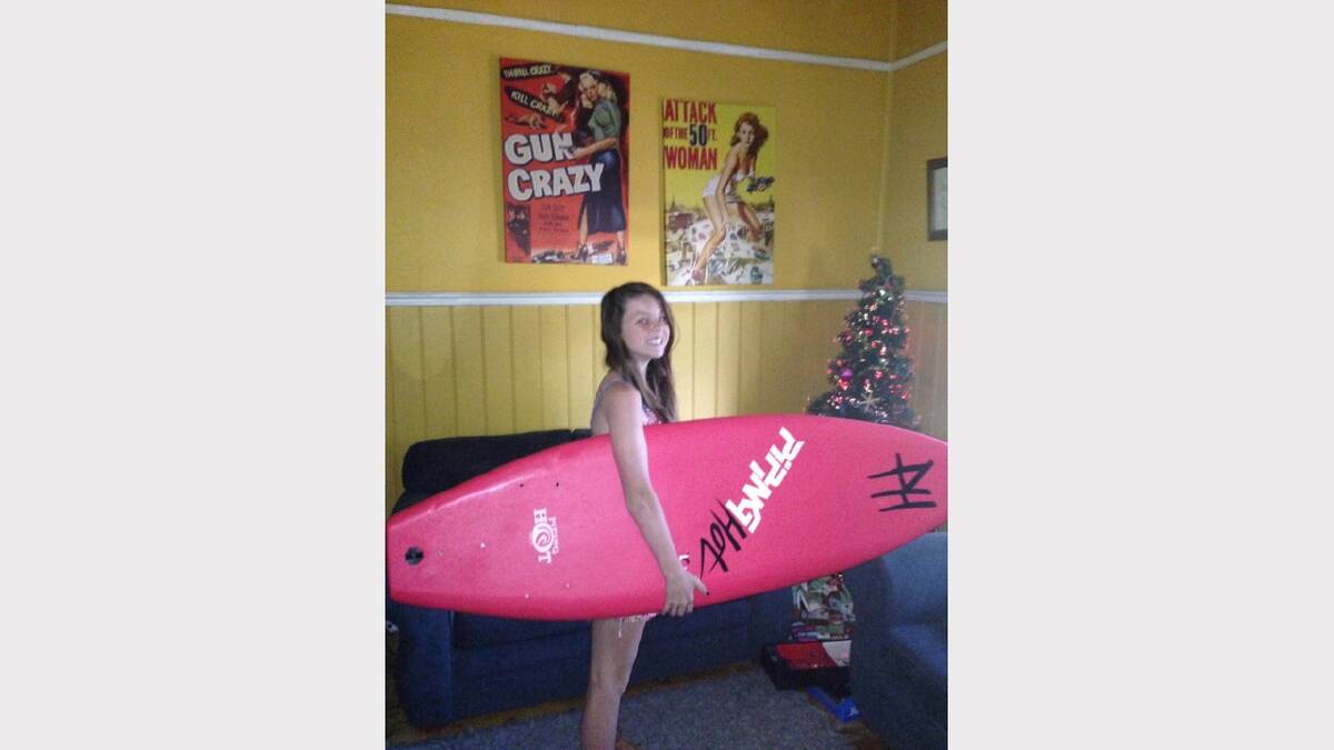 Your Christmas Day: Ruby Caldow looking for some waves after her Santa delivery.