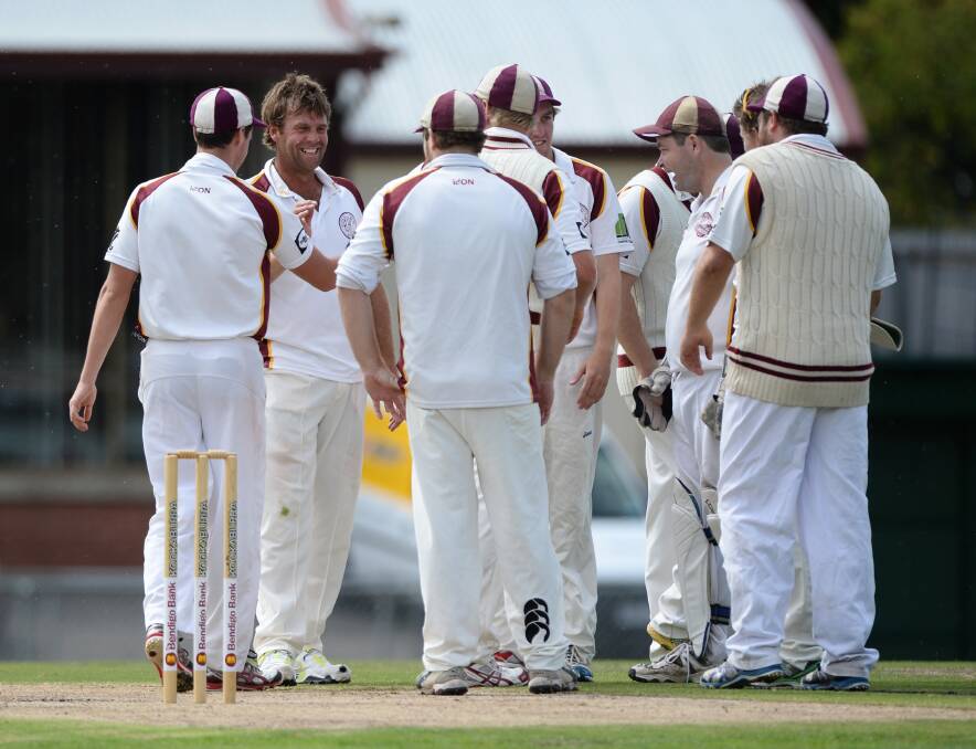 Brown Hill quick Shane Harwood is all smiles with teammates in BCA club firsts semi at City Oval. Photo: Adam Trafford