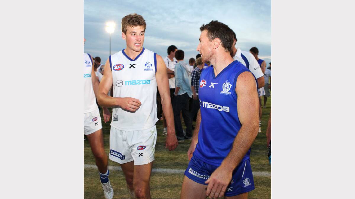 Cam Richardson chats with veteran Kangaroo Brent Harvey at North Melbourne's camp in Ballarat earlier this year.