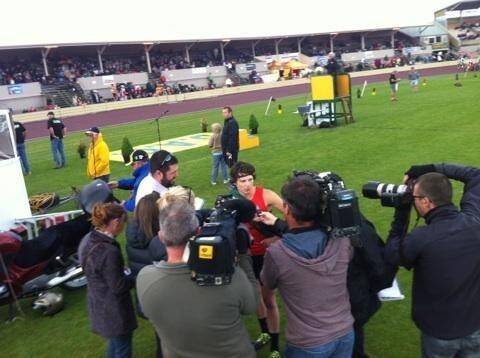 Sam Baird is swamped by media after winning the Australian 400m Professional Title in Devonport