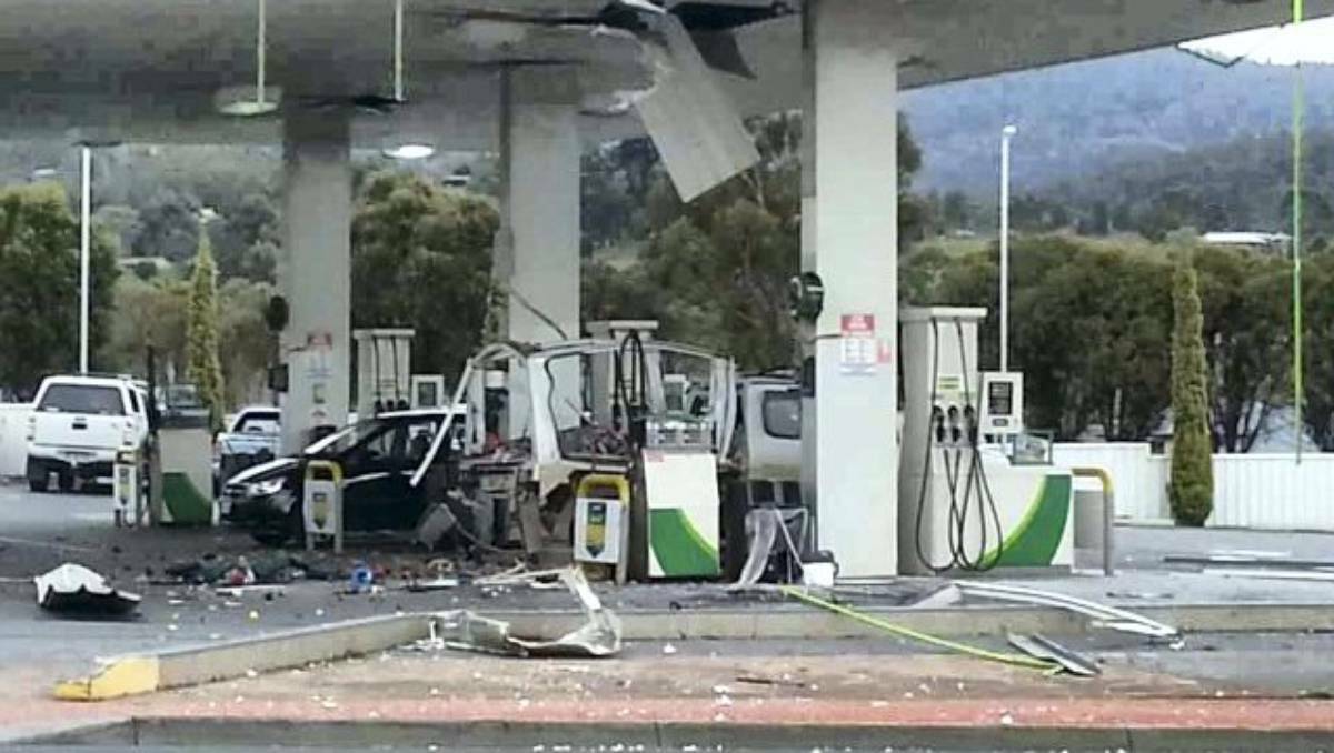 Scattered debris at the scene of a gas bottle explosion yesterday morning at a Margate service station. Photo: Niki Culph