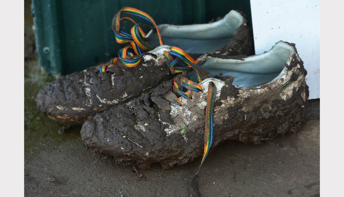 Muddy football boots with rainbow laces on them for Zaidees Rainbow Foundation Organ and Tissue Awareness at the Gordon versus Beaufort match. PICTURE: KATE HEALY. 
