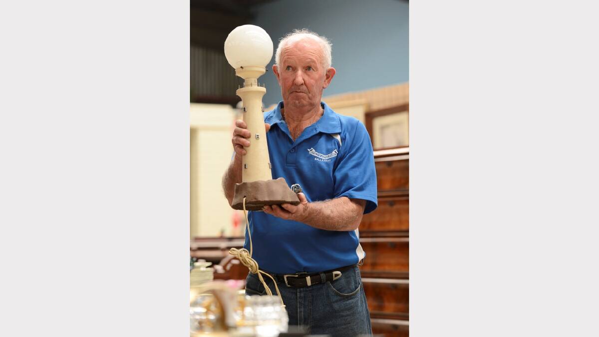 Barry Shalders holds a lamp from the property. PICTURE: ADAM TRAFFORD.