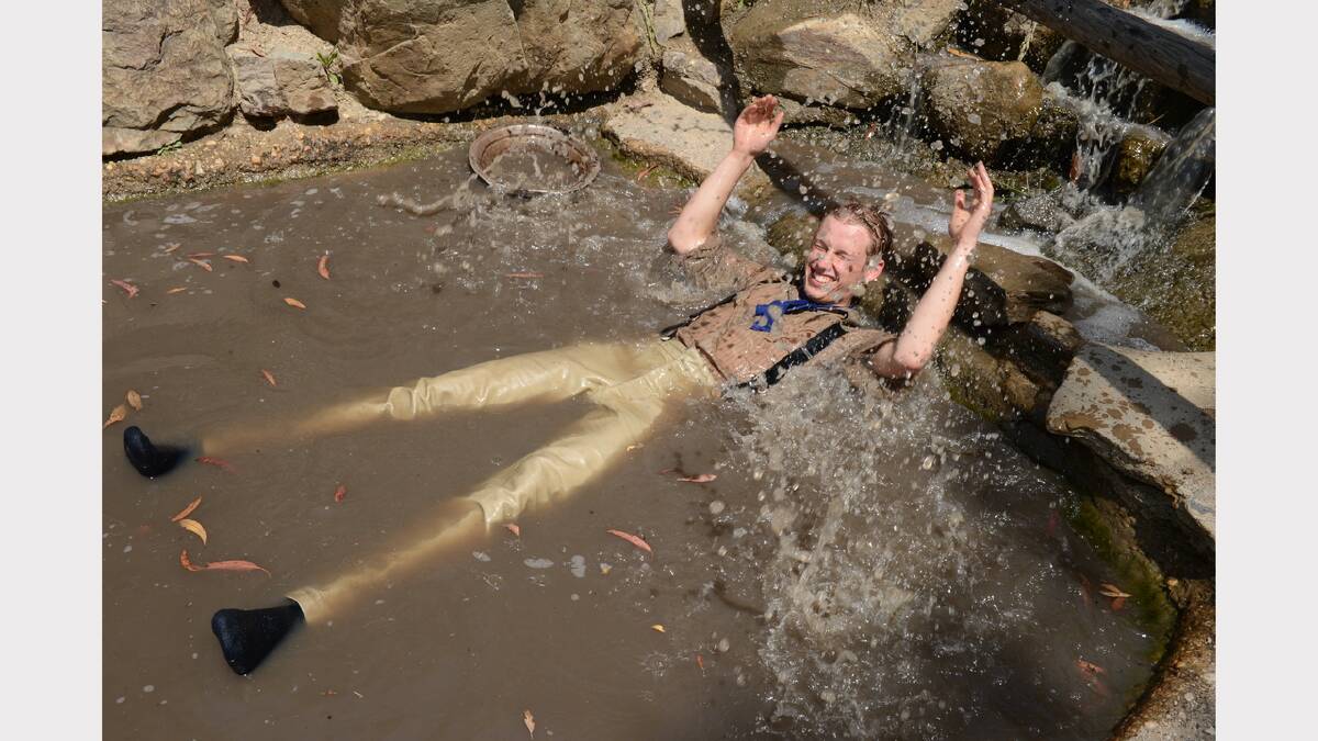 Rob Muirhead cooling off in the creek at Sovereign Hill. PICTURE: KATE HEALY. 