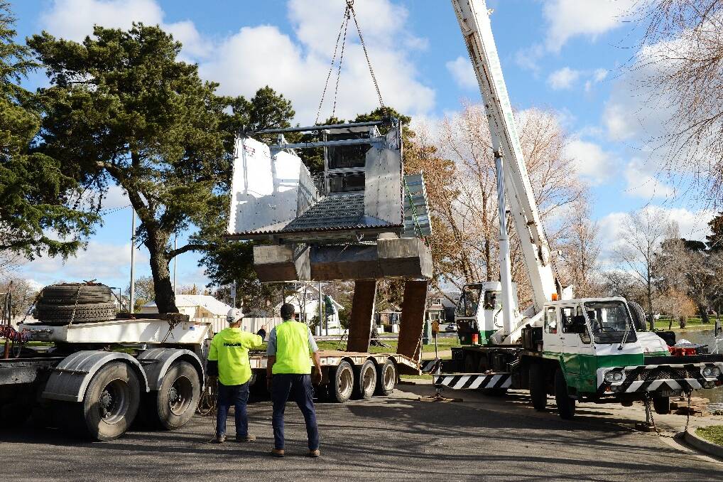 "Chopper Weed" being loaded onto Lake Wendouree yesterday. PICTURE: KATE HEALY