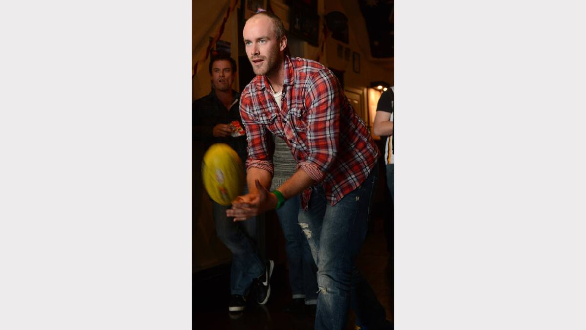 Sean Liston in the half-time handball competition at JDs Sports Bar. PICTURE: ADAM TRAFFORD