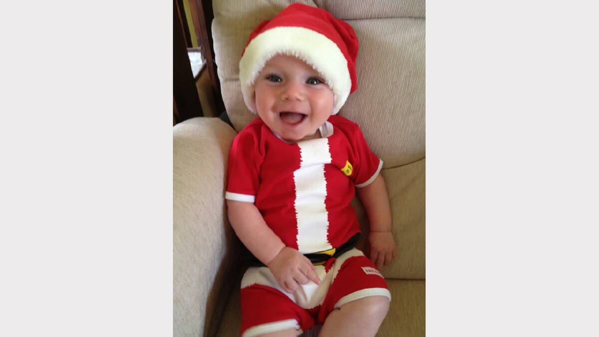 Arthur Gerard Wayne den Ouden - Santa's cutest little helper! Son of Libby and Eddy! Submitted by reader Libby Purtell. 