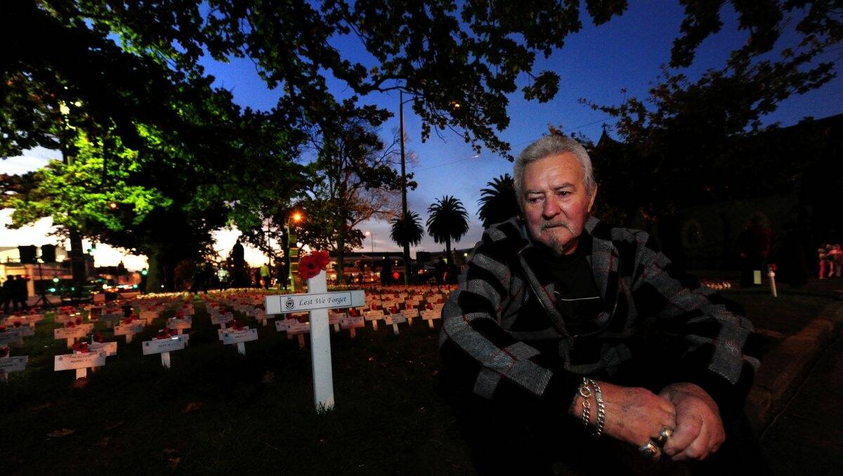 Mick Eaton was one of thousands who attended this morning's dawn service at the Cenotaph. He was remembering his uncles who served in Papua New Guinea. PICTURE: JEREMY BANNISTER 