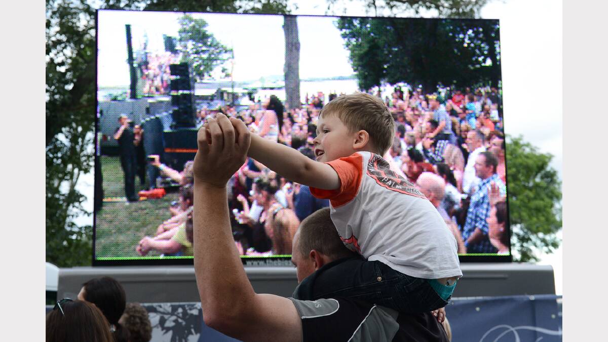 Charlie Taylor - 5yo, on the shoulders of dad Jamie Taylor during Daryl Braithwaite. PICTURE: ADAM TRAFFORD. 