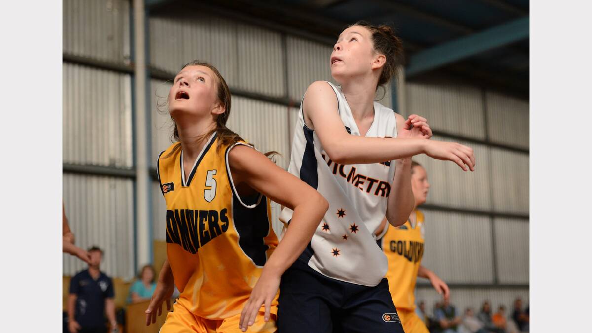 Under 15 girls: Victoria Country v Victoria metro. Country's Millie Culliver and Metro's Charlotte Coloe. PICTURE: ADAM TRAFFORD