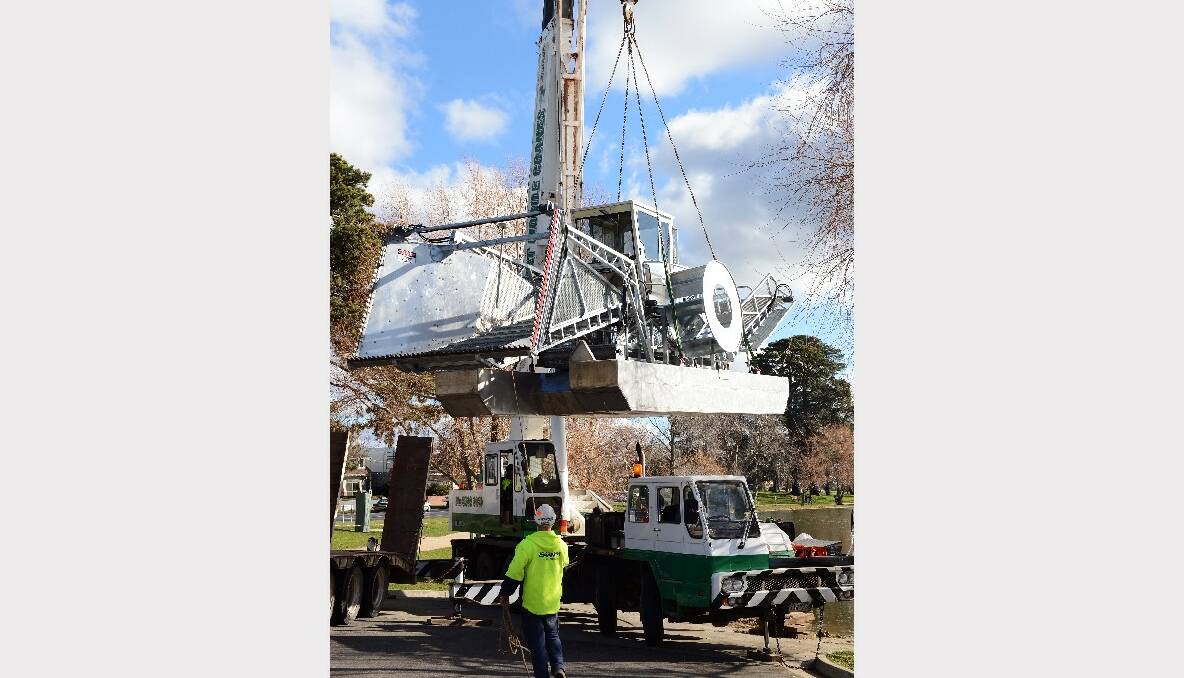 "Chopper Weed" being loaded onto Lake Wendouree yesterday. PICTURE: KATE HEALY