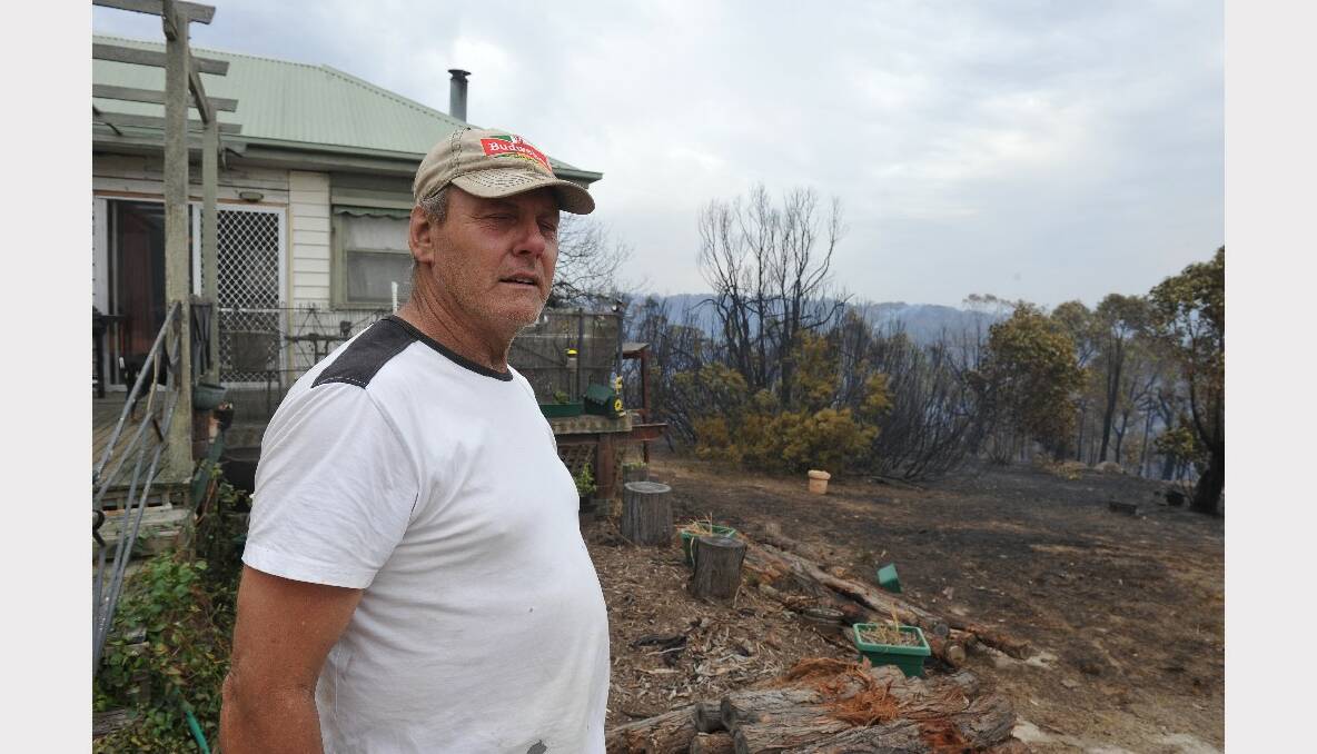 Flames burned within metres of Doug Braddy's house. PICTURE: LACHLAN BENCE