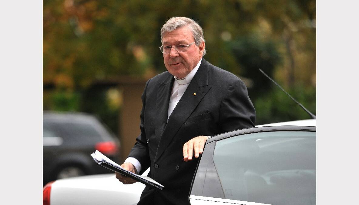 Cardinal George Pell arrives at Victoria's Parliament House to give evidence to the inquiry into institutionalised child sex abuse. PICTURE: JOE ARMAO
