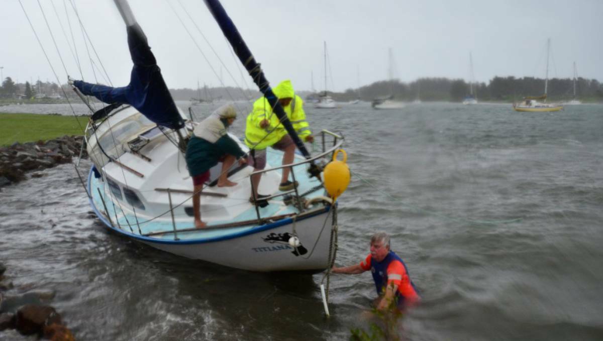 Port Macquarie Marine Rescue looking to assist a stricken yachtsman near the Westport Club on Monday. Photo: Nigel McNeil/Port Macquarie News
