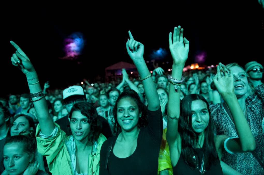 Crowds watch Santigold perform at the 2012 Harvest Festival held at the city Botanic Gardens in Brisbane. Photo: Harrison Saragossi.