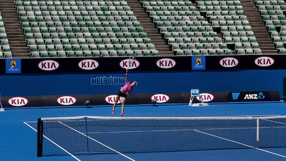 Sam Stosur practices in front of an empty court at Melbourne Park. Photo: Paul Jeffers