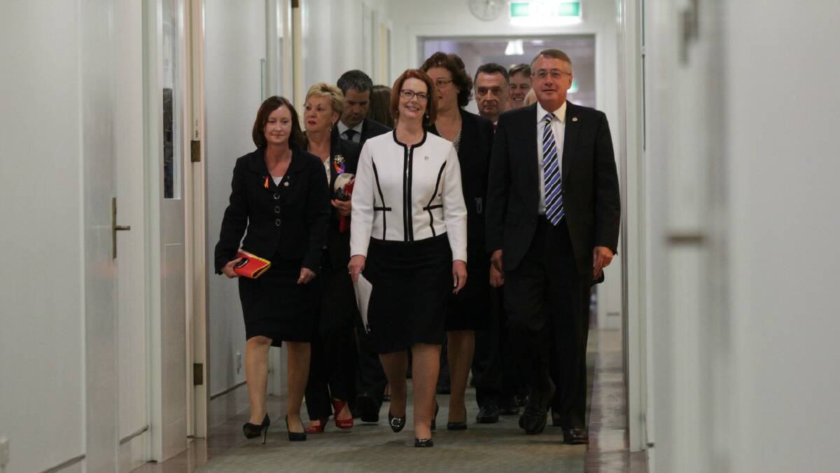 Prime Minister Julia Gillard arrives for caucus meeting, at Parliament House in Canberra on Thursday 21 March 2013. Photo: Alex Ellinghausen