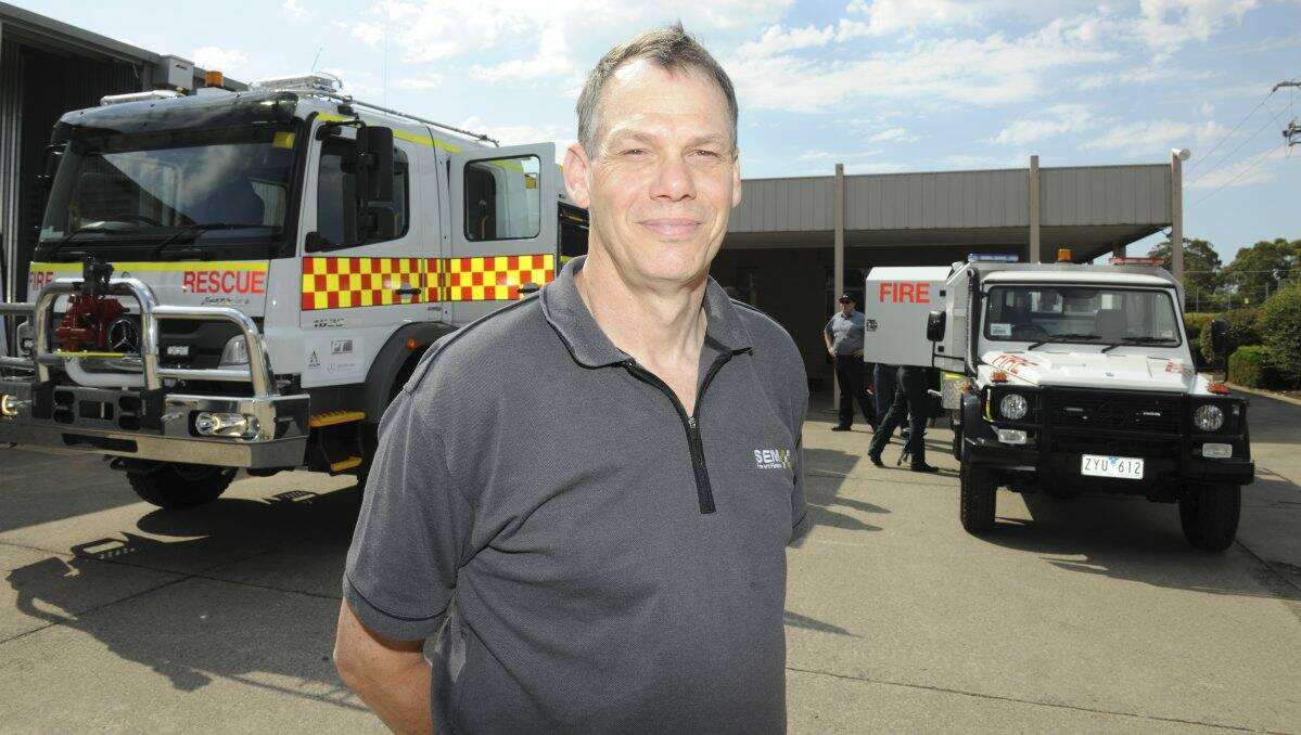 SEM Fire and Rescue general manager Colin Baldock with one of the new trucks.