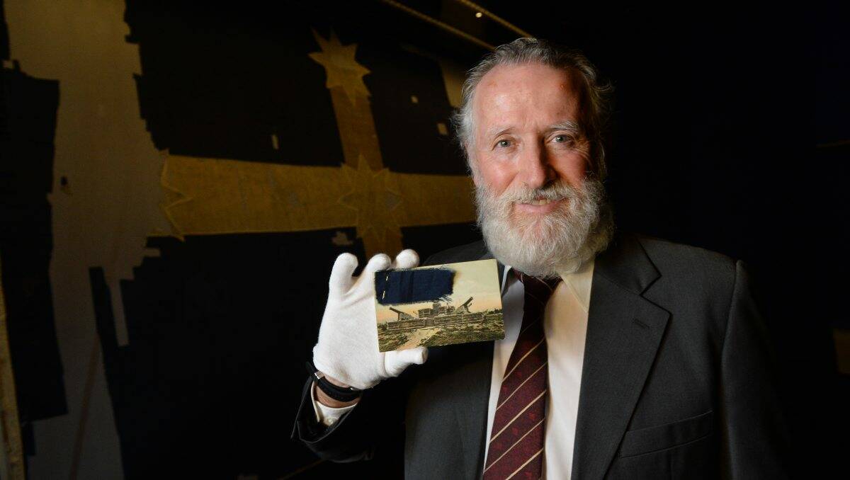 Adrian Millane with a fragment of the Eureka flag which has been handed down through generations of his family. 