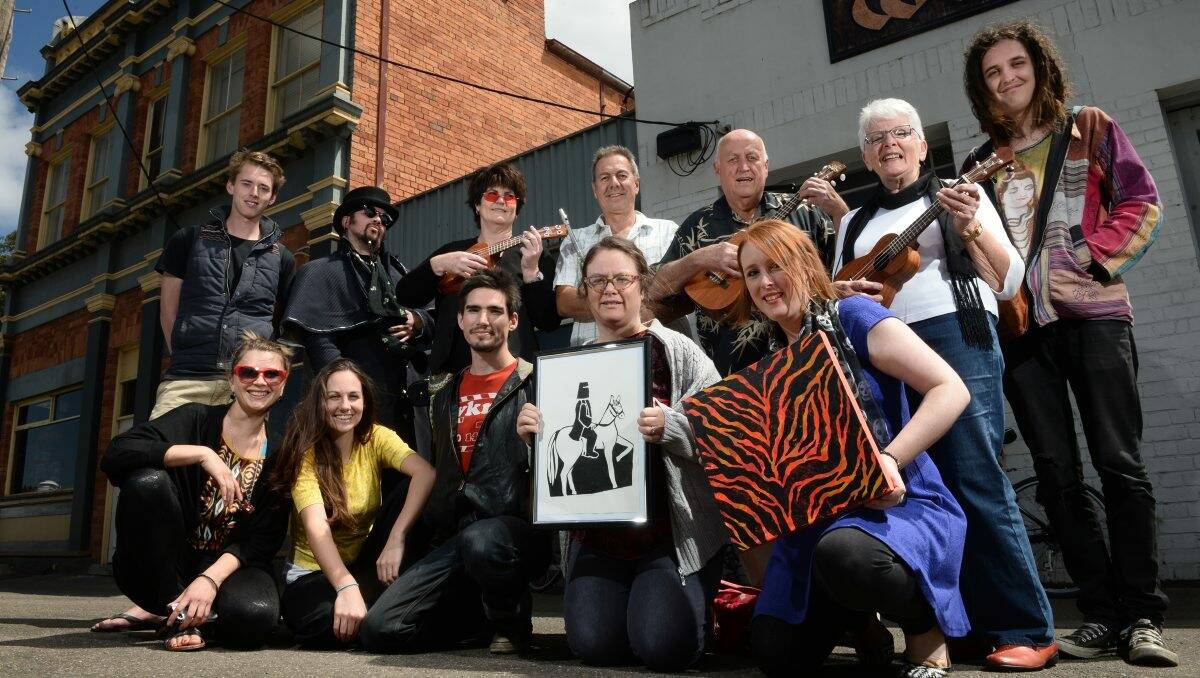 (From back left) Sam Brown, Garth, Vickie-Maree Barnett, George Walpole, Darryl Button, Kath Button (Ballarat Ukulele Collective) and Steve Seeary. (Front, from left) Aldona Kmiec, Amy Tsilemanis, Andrew Beyerle, Penny Hetherington and Laura Day.