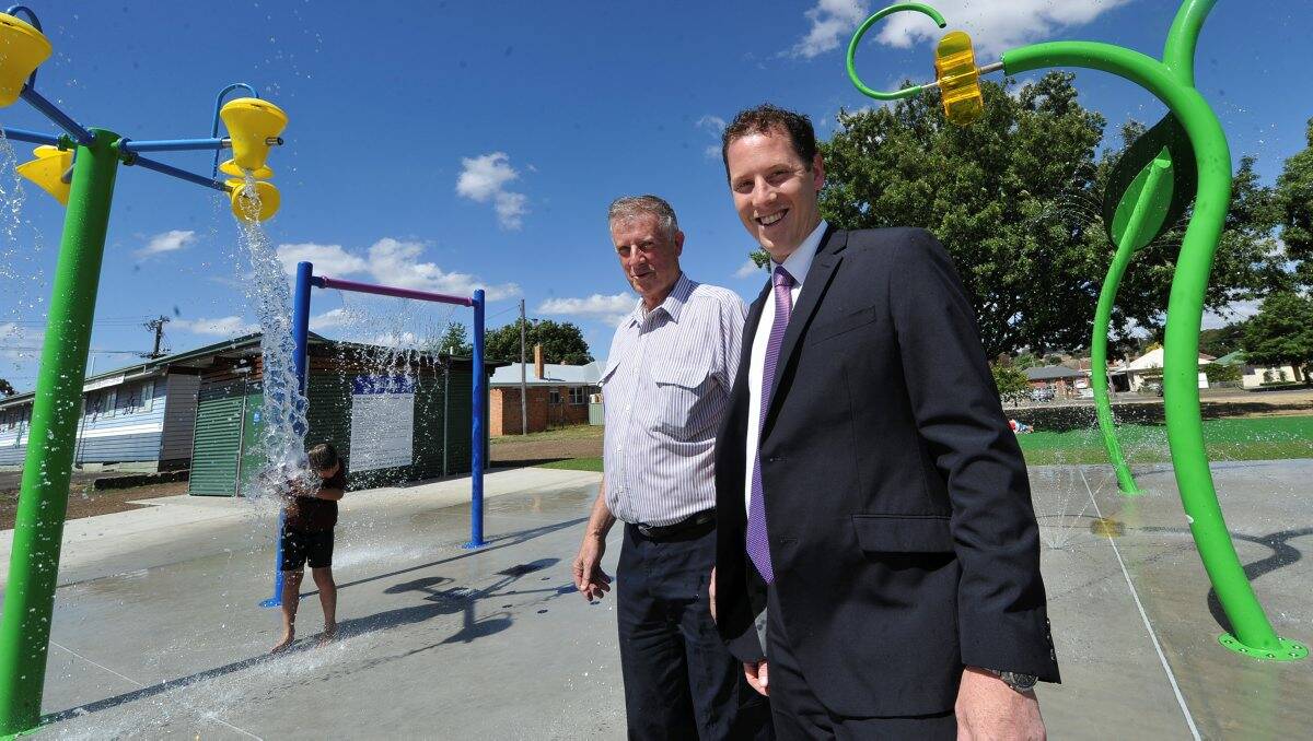 Ballarat City councillor John Philips and mayor Joshua Morris check out the new additions to the water spray park.