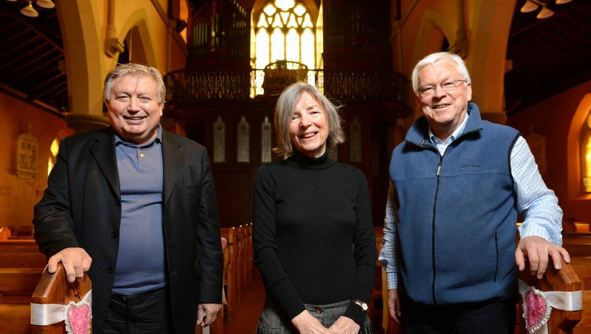 Organs: Festival director Sergio de Pieri, left, inspects one of the venues – St Alipius Church – with assistant director Judy Houston and Father Adrian McInerney. PICTURE: ADAM TRAFFORD