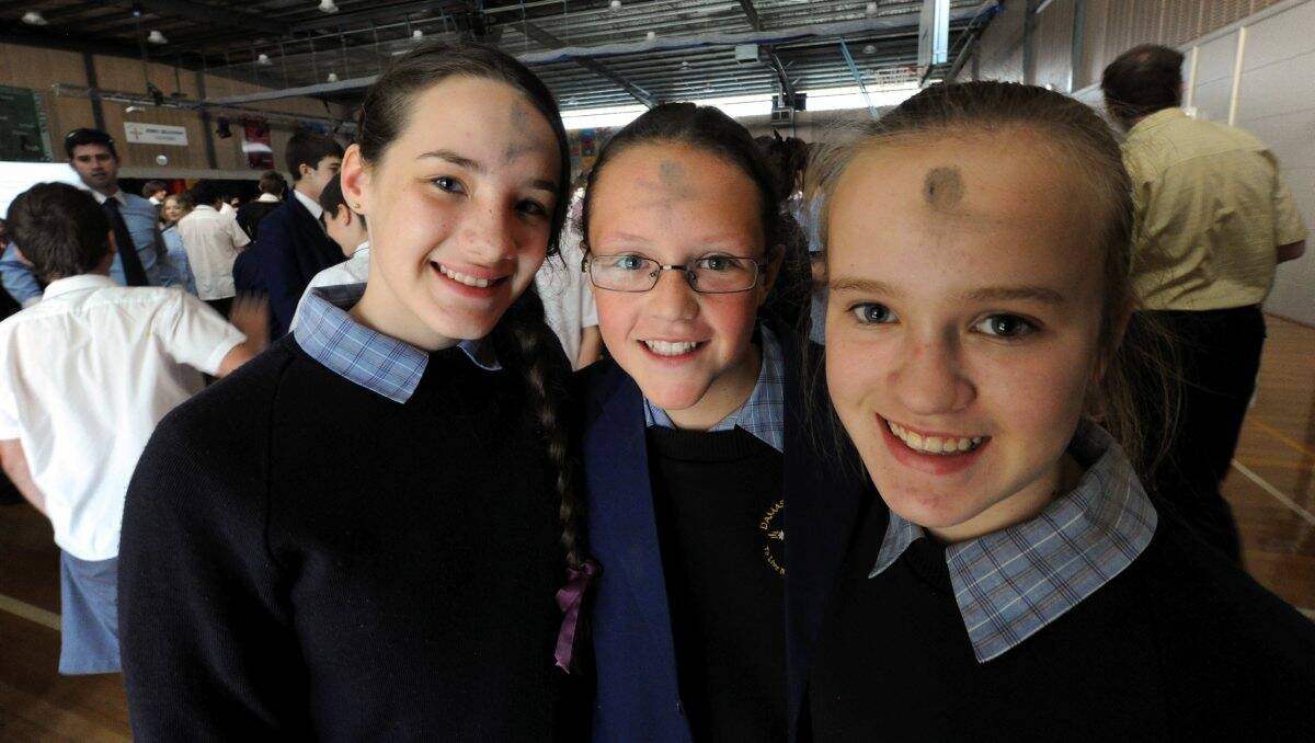 Damascus College students Amelia Johnson, Jessica Rowse and Georgia Blake with the sign of the cross on their foreheads after the Ash Wednesday Mass.