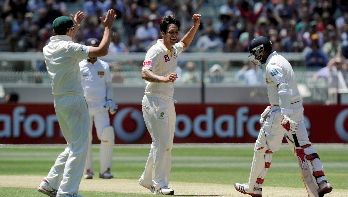 2nd Test: Australia v Sri Lanka.Australia's Mitchell Johnson celebrates the wicket of Sri Lanka's Dhammika Prasad at the MCG.