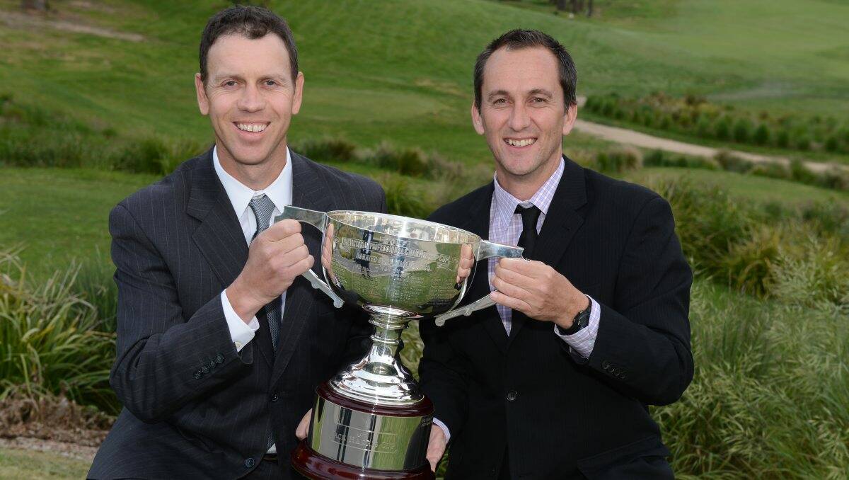 Revamped: 1999 Australian Masters champion Craig Spence, left, and PGA Australia southern division executive officer Geoff Stewart with the Victorian PGA Championship perpetual trophy.