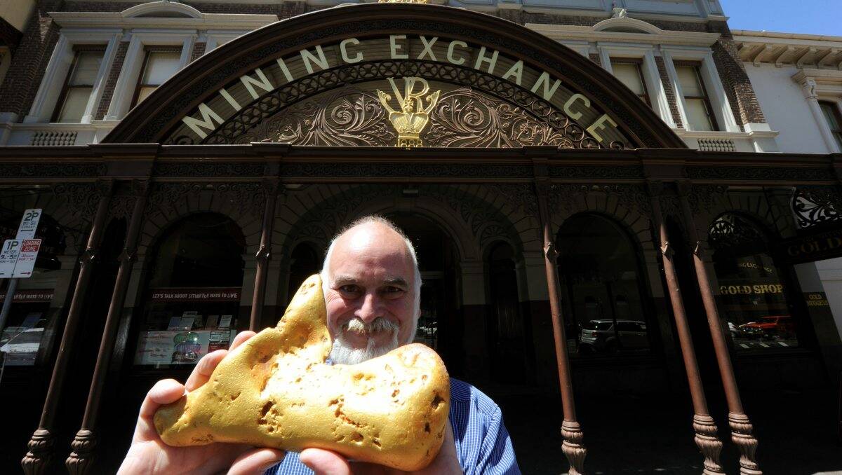 Gold Shop owner Cordell Kent with a replica of The Ballarat Nugget which has been sold.