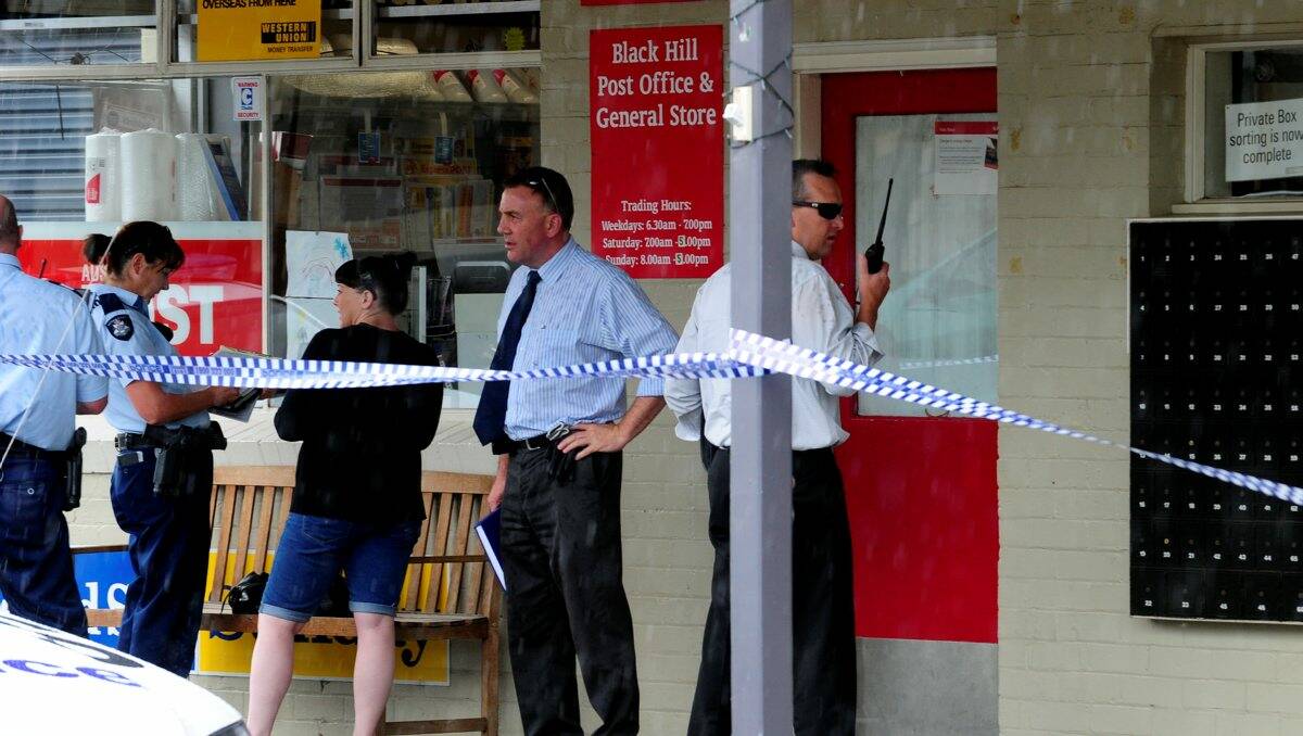 Police and detectives interview witnesses after the hold up on Tuesday. PICTURE: JEREMY BANNISTER