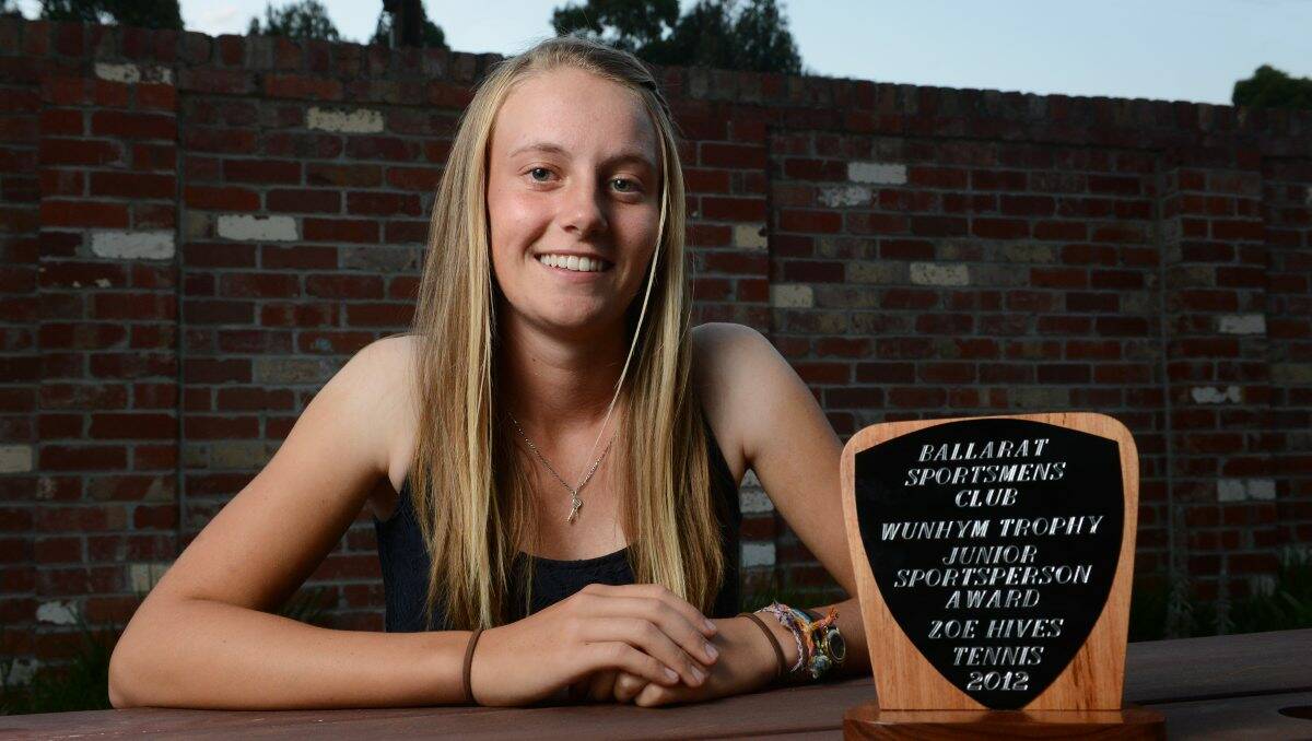 Back-to-back: Teen tennis star Zoe Hives with her Wunhym Trophy last night.