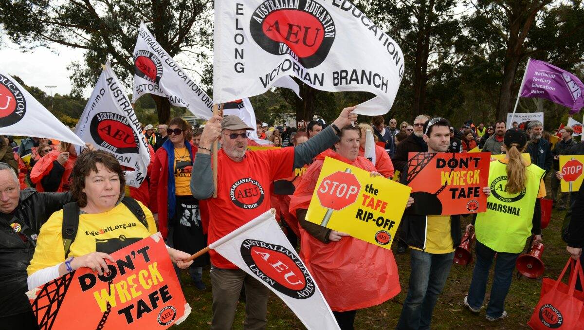 Protesters get their message across about TAFE cuts yesterday. PICTURE: KATE HEALY