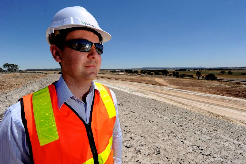 Senior engineer Sam Brown looks over work on the Western Highway duplication project near Trawalla.