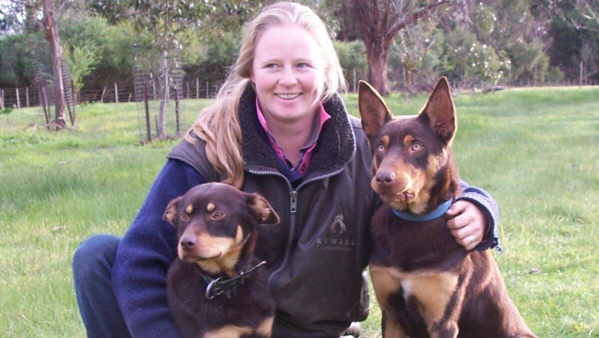 Workers: Zoe Crouch with two kelpies.