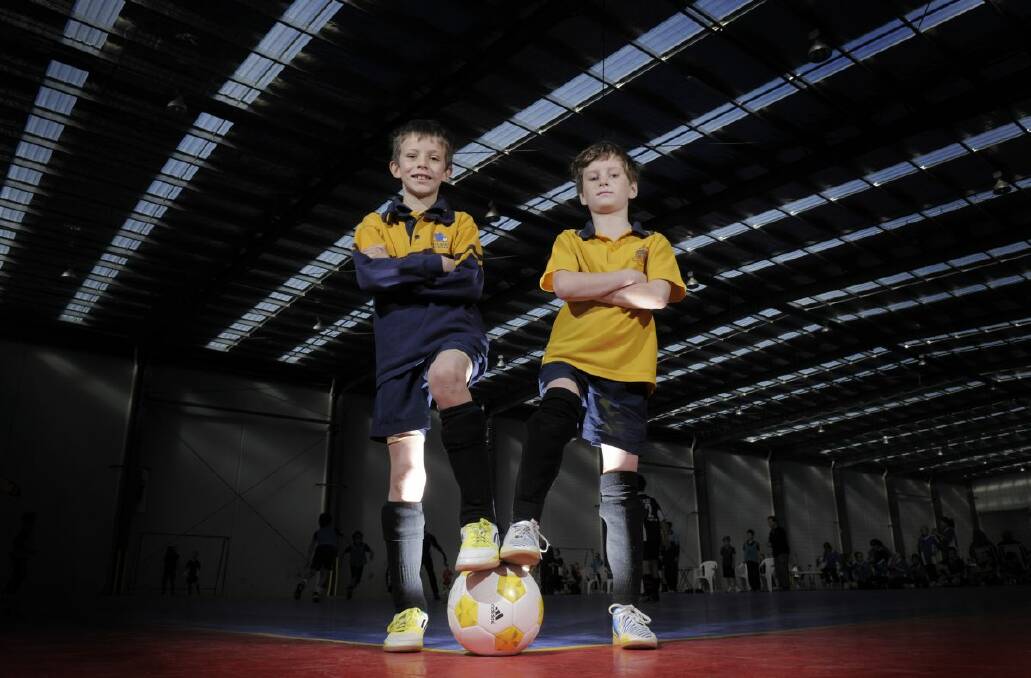  Dan Thomson, 8, Oliver Warwick, 9, have a go at futsal. 