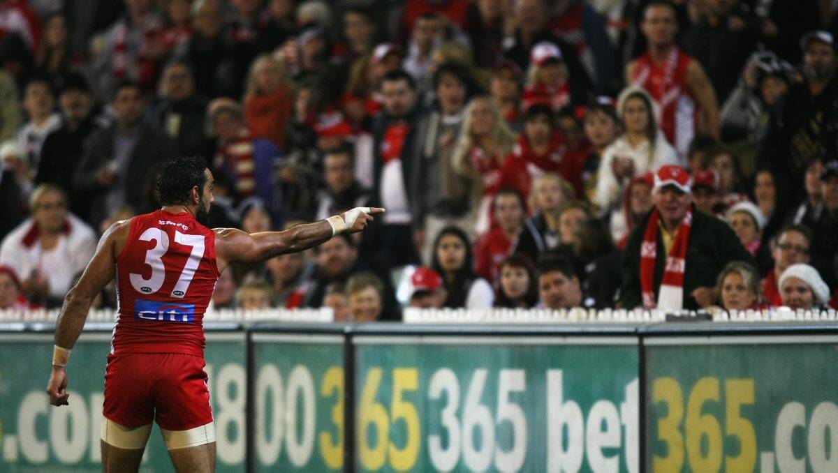 Adam Goodes points out the person who abused him last Friday night.