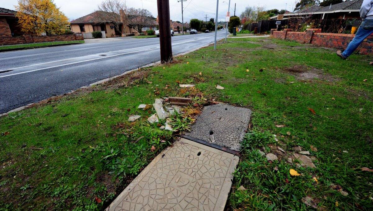 A Tesltra pit with suspected asbestos debris in Ballarat. PICTURE: THE COURIER