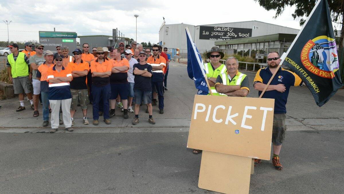 The Laminex workers on the picket line yesterday.