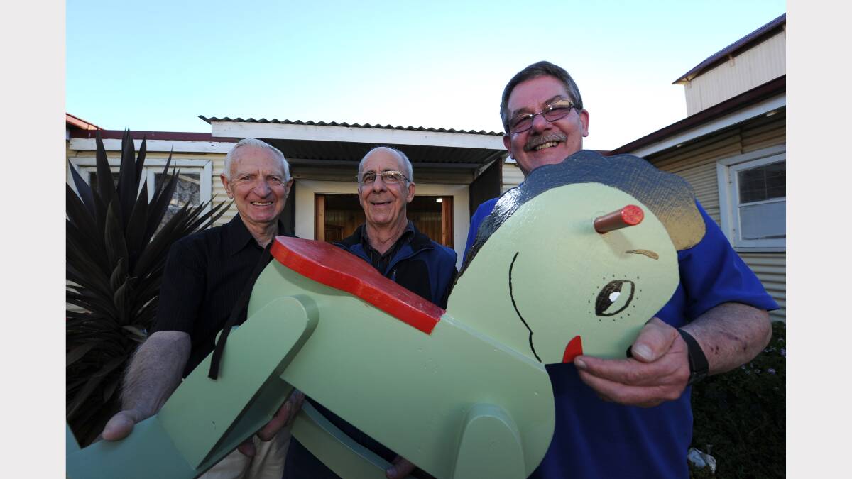 Woodworkers donation: Peter Caligari (3BA Appeal), Rob Thomas (toy maker), David Izard, (President of the Ballarat Woodworkers Guild)       