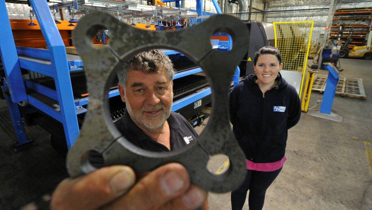 BRANCHING OUT: Ballarat Pressings CEO Keith Parry and laser manager Kirrily Parry. PICTURE: LACHLAN BENCE