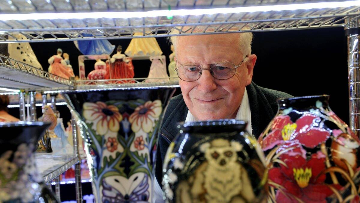 Admiring some Moorecroft pottery at the 44th annual Ballarat Antique and Vintage Fair is John Hurley.