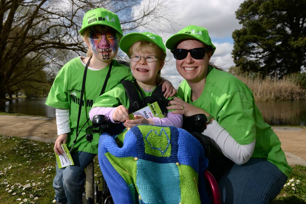 Bec Paton with her children, Hannah and Sarah, at the Walk With Me event at Lake Wendouree. 