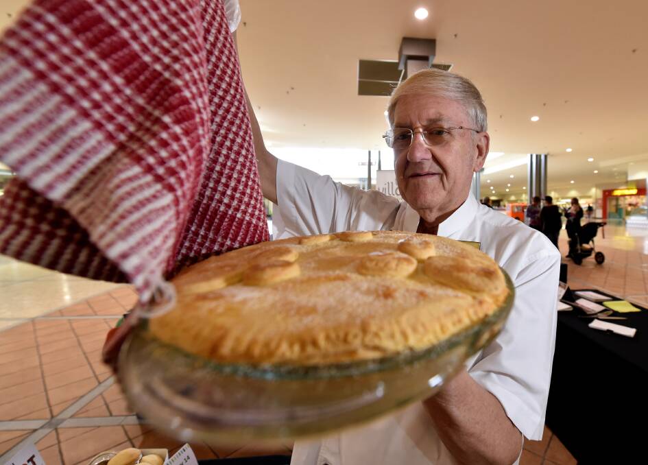 Bacchus Marsh Harvest Festival Best Apple Pie competition judge Ian Pertzel with a pie for judging.