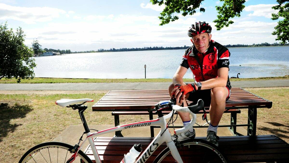 FIT AS A FIDDLE: International cycling commentator Phil Liggett goes for a ride around Lake Wendouree yesterday. PICTURE: JEREMY BANNISTER