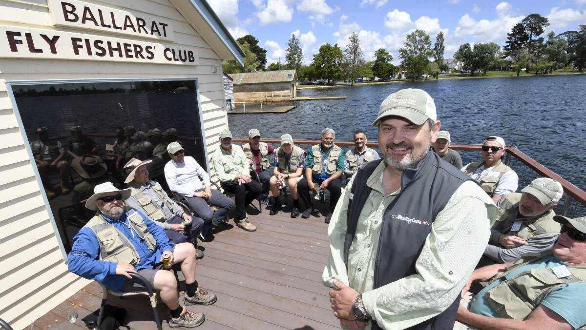 Mending Casts president John Billing with the men's Reel Recovery program at the Fly Fishing Club. Picture by Lachlan Bence