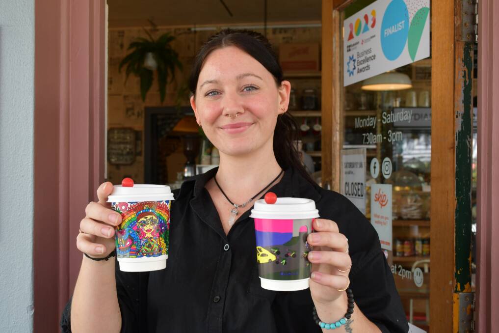 LYDIARDgeneral's Linda Fleming holds two unique coffee cups designed by local artists for RoadNats 2024. Picture by Alex Dalziel