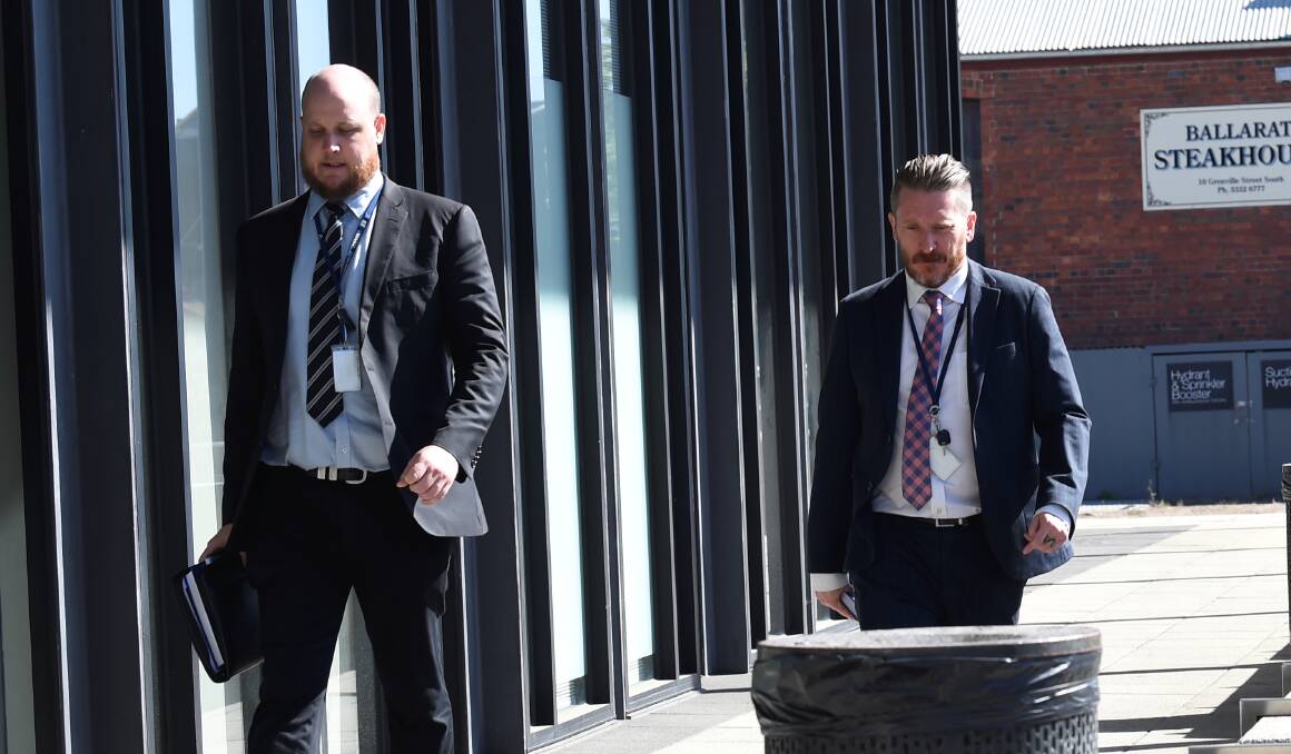 Detectives outside of the Ballarat Law Courts. Picture by Lachlan Bence