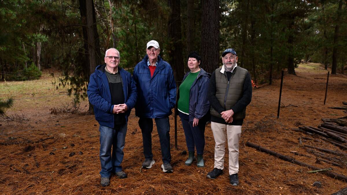 Objectors Rob Buchanan (left), Jeff Sculley, Tracie Currie and Jeff Rootes at the border of the proposed subdivision site. Picture by Adam Trafford